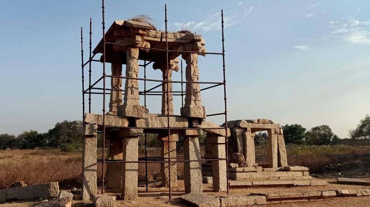 Restoration work underway at Hampi. Credit: DH Photo