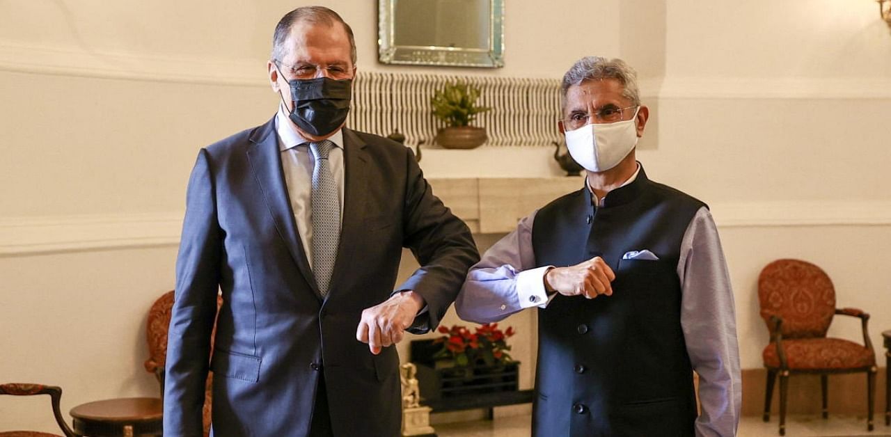 Russia's Foreign Minister Sergei Lavrov and his Indian counterpart Subrahmanyam Jaishankar pose for a picture during a meeting in New Delhi, India, April 6, 2021. Credit: Russian Foreign Ministry/Handout via Reuters