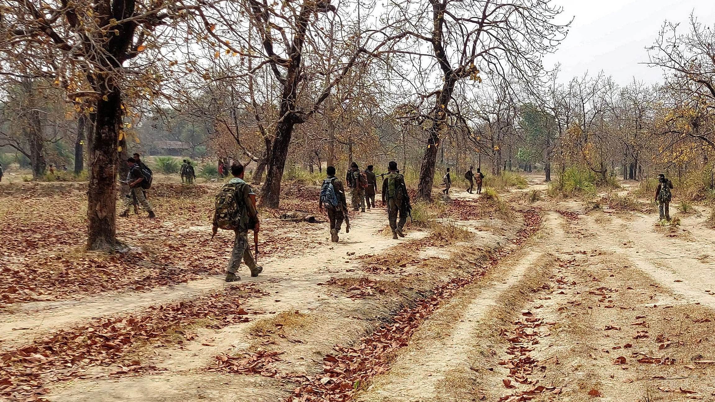 <div class="paragraphs"><p>Security force personnel patrol after an attack by Maoist fighters. </p></div>