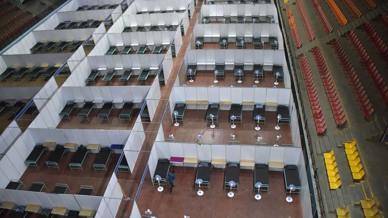 A covid care centre set up at Kormangala Indoor Stadium in Bengaluru. Credit: DH Photo/Janardhan B K