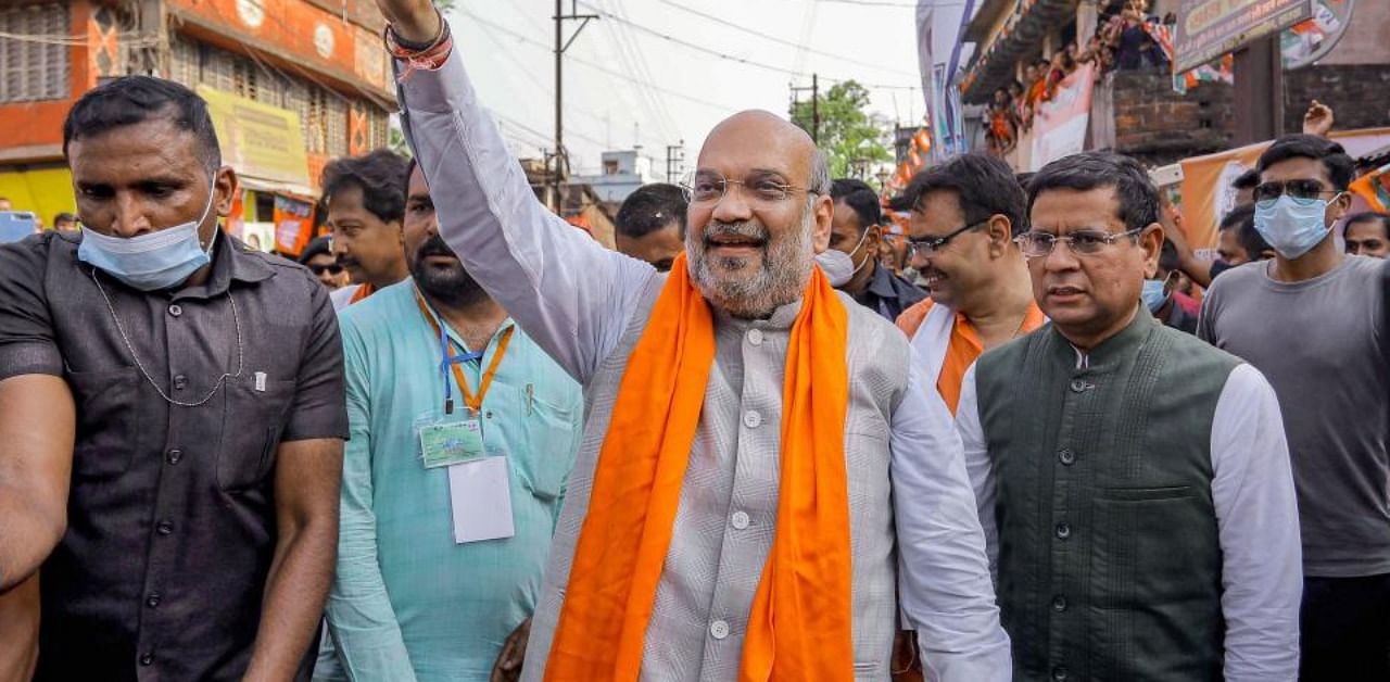 Union Home Minister and senior BJP leader Amit Shah during an election campaign road show for Assembly polls at Domjur in Howrah district, Wednesday, April 7, 2021. Credit: PTI Photo