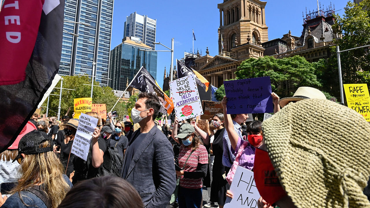 Protesters rally outside Town Hall in response to the treatment of women in politics following several sexual assault allegations. Credit: Reuters File Photo