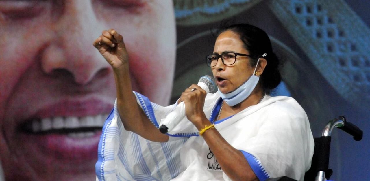  West Bengal CM & Trinamool Congress supremo Mamata Banerjee addresses an election campaign rally in favour of party candidadtes for State Assembly polls, in Kolkata. Credit: PTI Photo