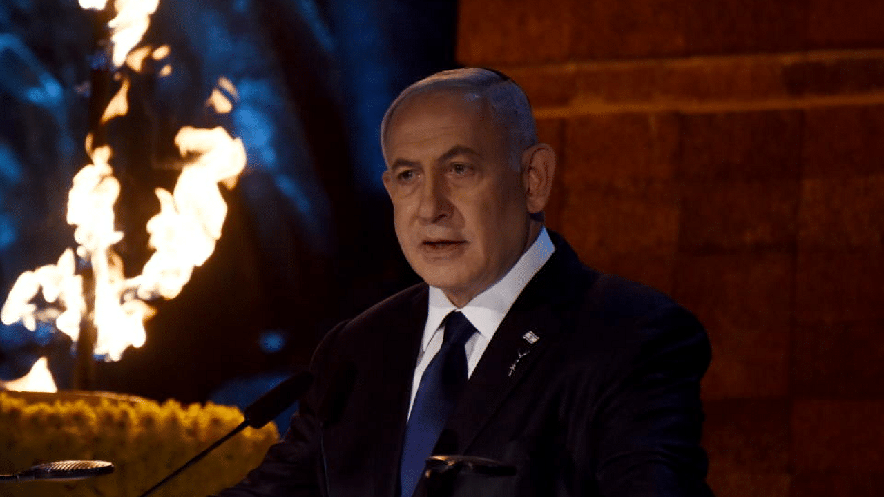 Israeli Prime Minister Benjamin Netanyahu delivers a speech at the Holocaust Martyrs' and Heroes Remembrance Day opening ceremony in memory of the six million Jewish men, women and children murdered by the Nazis and their collaborators, at Yad Vashem Holocaust Museum in Jerusalem April 7, 2021. Credit: AFP Photo