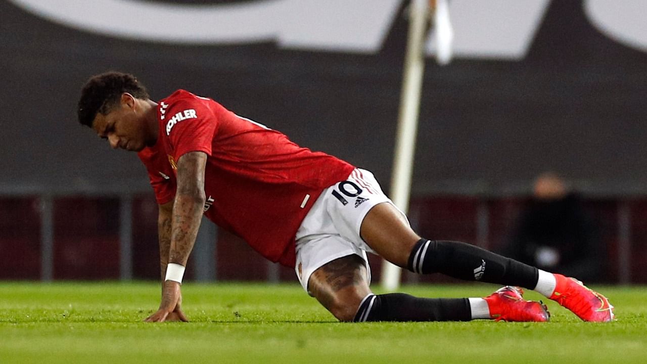  Manchester United's Marcus Rashford after sustaining an injury. Credit: Reuters Photo