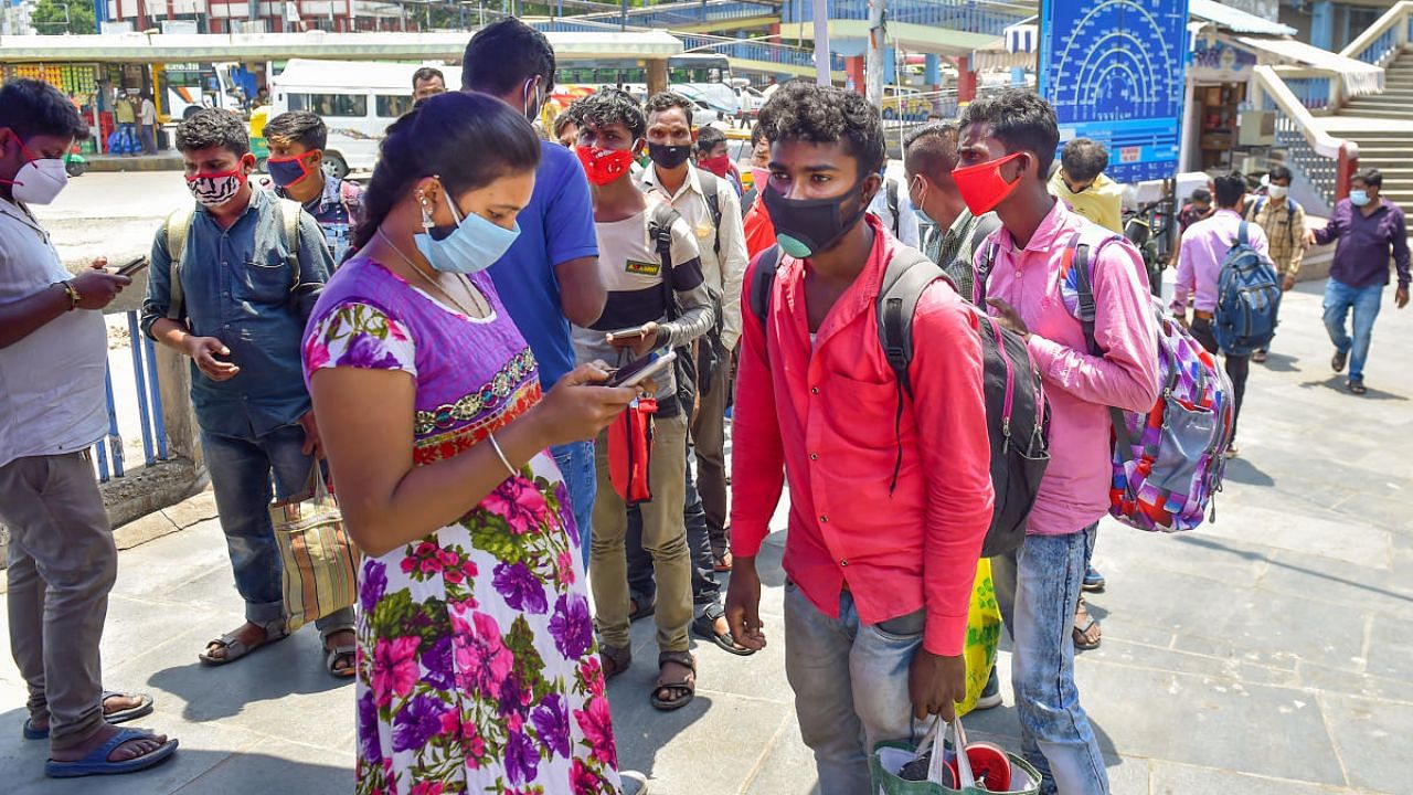 Passengers being registered for Covid-19 tests at KSRTC bus stand, amid surge in coronavirus cases, in Bengaluru. Credit: PTI photo. 