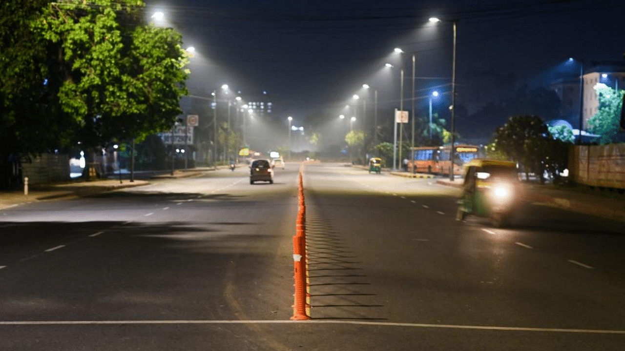 A street is pictured in New Delhi on April 6, 2021, as the Indian capital imposed a night curfew a day after the nation posted a record coronavirus surge, with financial hub Mumbai also introducing similar restrictions. Credit: AFP Photo