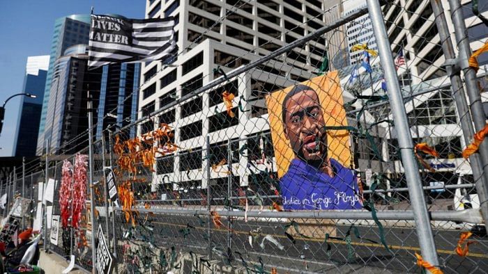 A portrait of George Floyd is seen outside of the Hennepin County Government Center. Credit: Reuters photo.