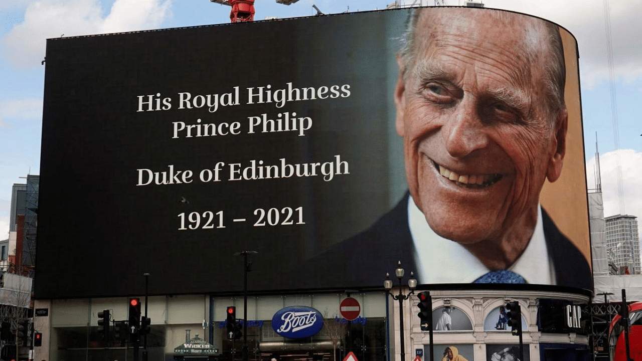 The electronic billboard at Piccadilly Circus displays a tribute to Britain's Prince Philip, Duke of Edinburgh in central London. Credit: AFP photo. 