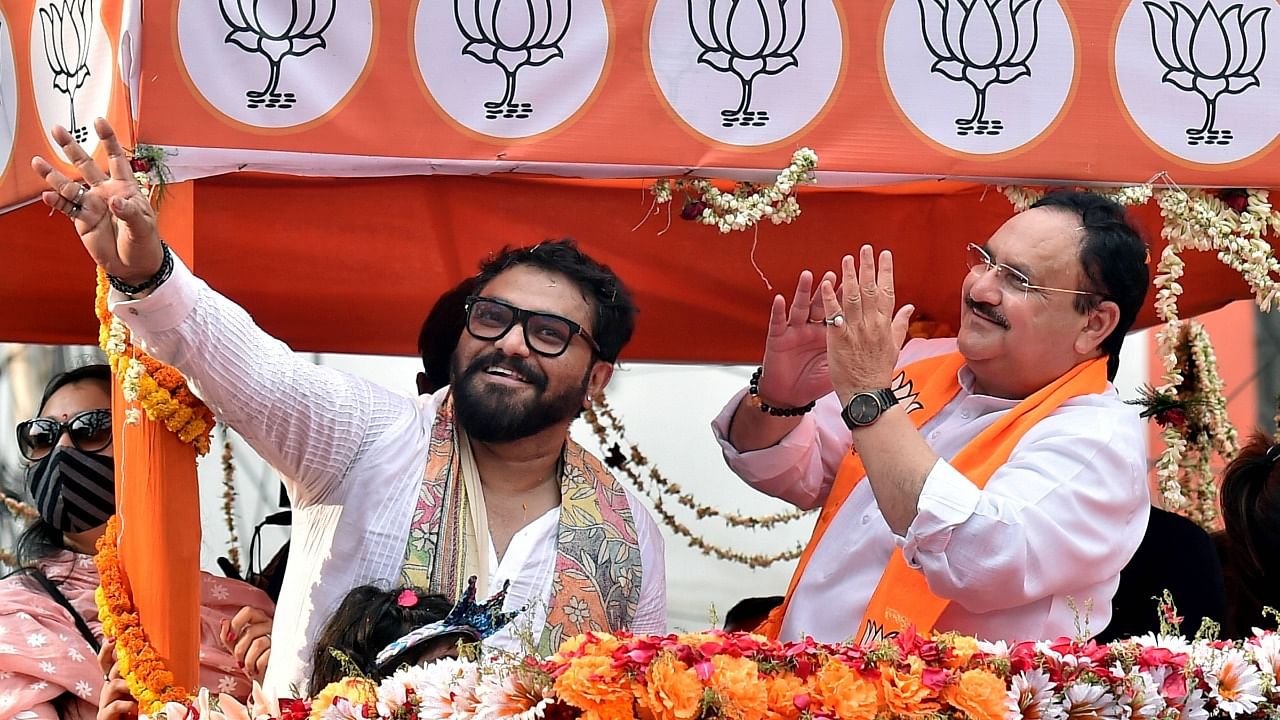 BJP National President J P Nadda during a roadshow in support of his party candidate Babul Supriyo (L), ahead of State Assembly poll in Kolkata, Monday, April 5, 2021. Credit: PTI Photo