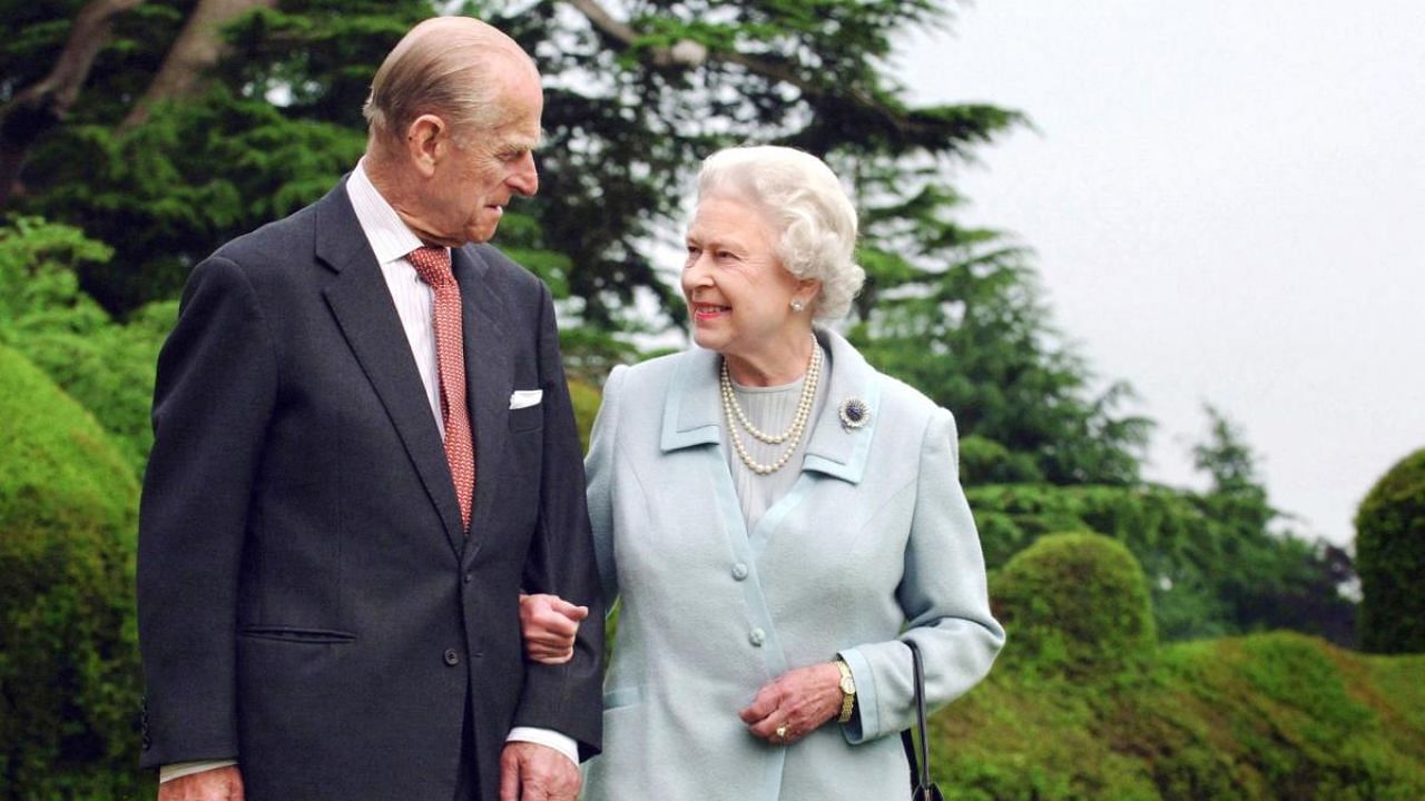 Britain's Queen Elizabeth II and her husband, the late Prince Philip. Credit: AFP file photo. 
