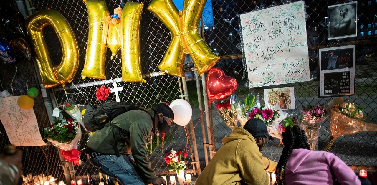 Fans at a makeshift memorial for the rapper. Credit: Reuters Photo