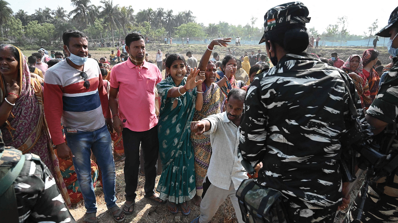 Central Armed Police Forces (CAPF) try to disperse villagers in Nandigram. Credit: AFP Photo