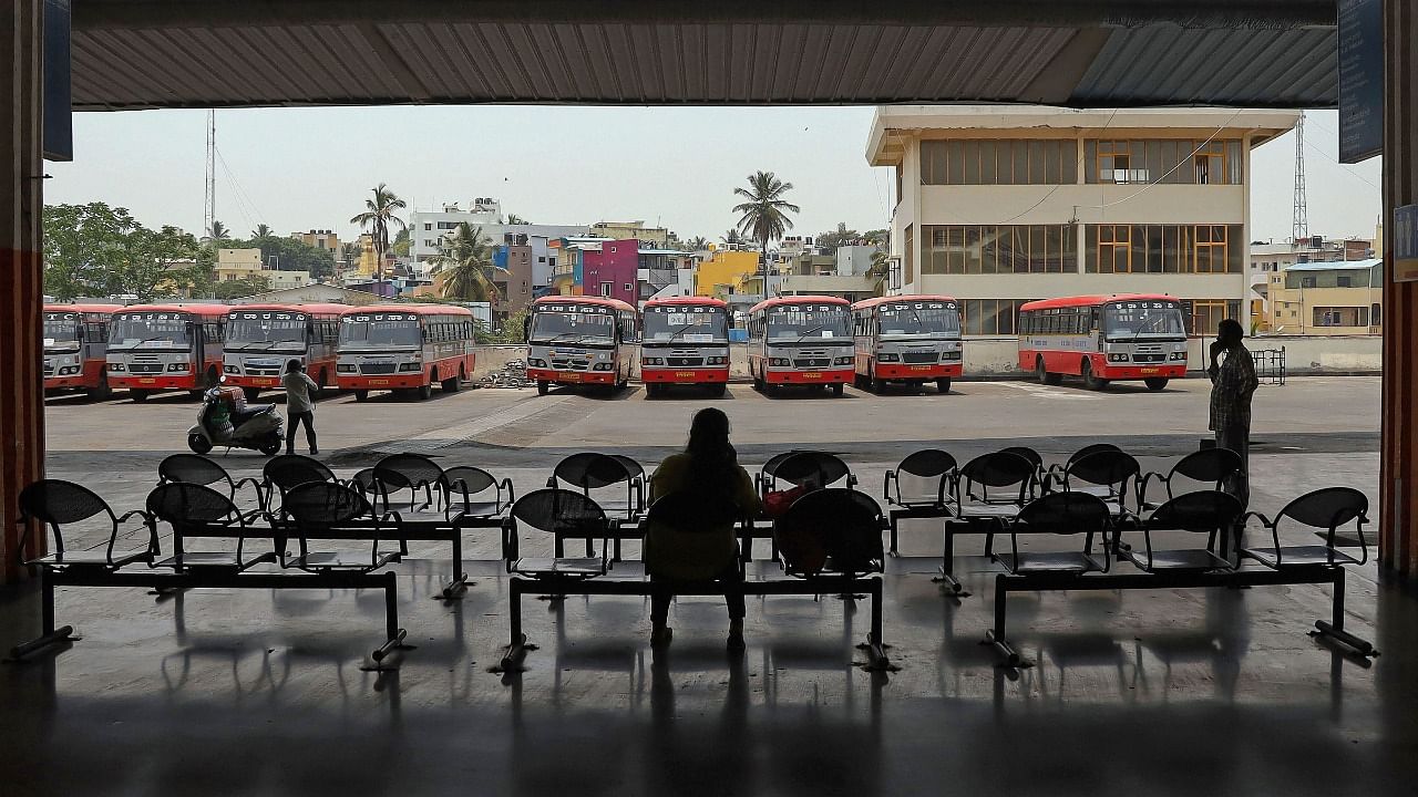 Mysore road satellite bus stand wears deserted look during KSRTC and BMTC bus employees go on with their indefinite strike in Bengaluru, Saturday, April 10, 2021. Credit: PTI Photo