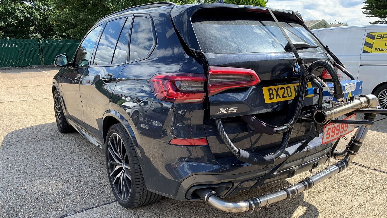 A BMW X5 plug-in hybrid is pictured while undergoing tests by Emissions Analytics for a study on emissions by NGO Transport & Environment in unknown location in this picture obtained by Reuters on March 31, 2021. Credit: Emissions Analytics/Handout via Reuters