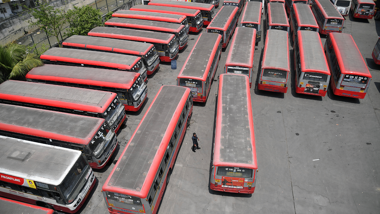 Several buses stationed during the indefinite strike called by RTC workers, at Satellite Bus stand, Mysore Road in Bengaluru. DH Photo/Pushkar V