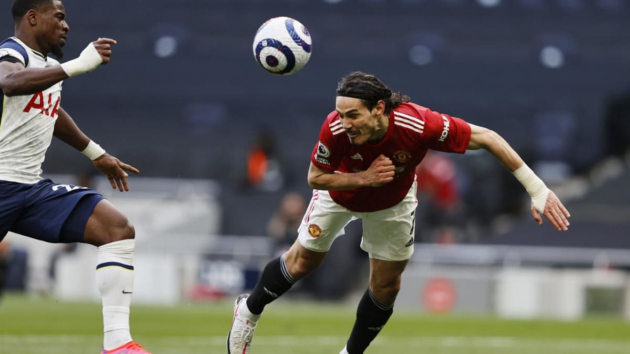 Manchester United's Edinson Cavani scores their second goal. Credit: Reuters Photo