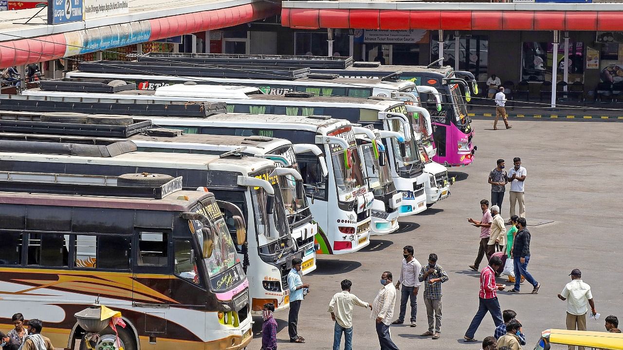 Private buses deployed at Kempegowda bus stand for public transport during a strike by KSRTC. Credit: PTI Photo