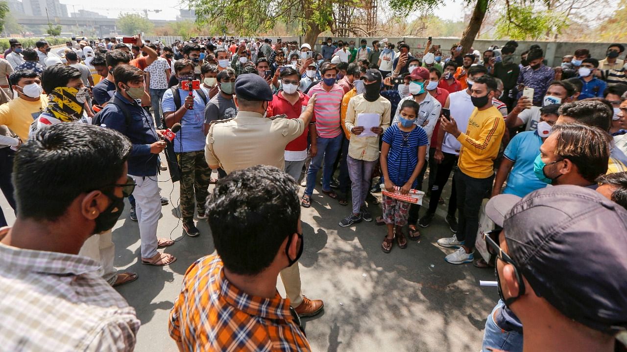 People gather outside Zydus Hospital to purchase Remdesivir injections, as coronavirus cases surge in Ahmedabad, Sunday, April 11, 2021. Credit: PTI Photo