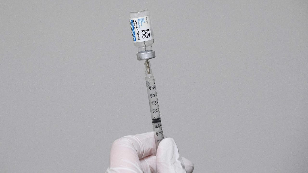 A syringe is filled with a dose of the Johnson & Johnson Janssen Covid-19 vaccine at a vaccination site in the United States. Credit: AFP File Photo