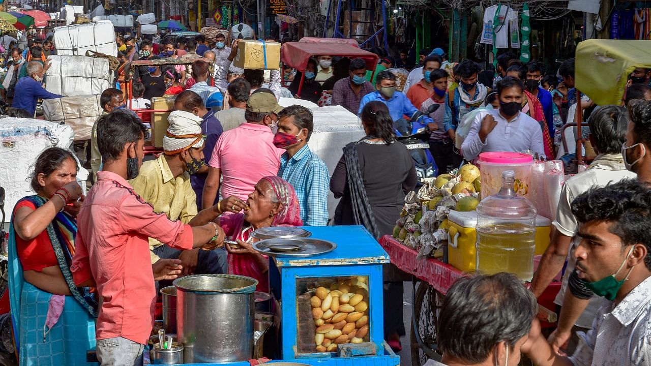 Crowd at Sadar Bazar, amid spike in coronavirus cases, in New Delhi, Tuesday, April 13, 2021. Credit: PTI Photo