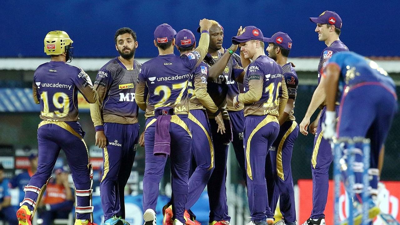 KKR players celebrate the fall of a wicket during the first innings against Mumbai Indians. Credit: PTI Photo