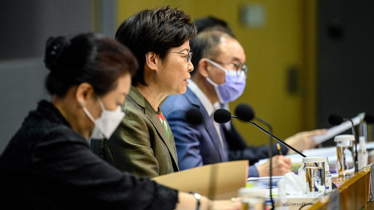 Hong Kong's Chief Executive Carrie Lam (C) speaks during a press conference at the government headquarters in Hong Kong. Credit: AFP photo