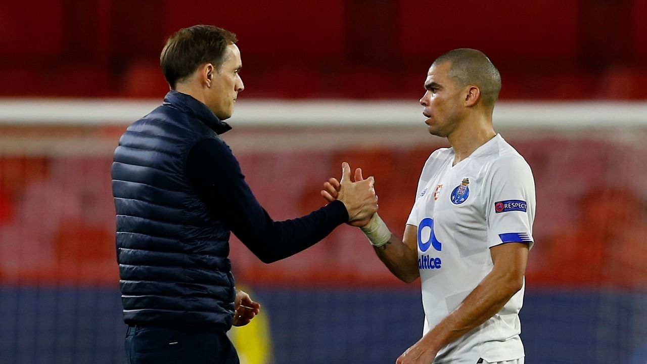 Chelsea manager Thomas Tuchel shakes hands with FC Porto's Pepe after the match. Credit: Reuters photo