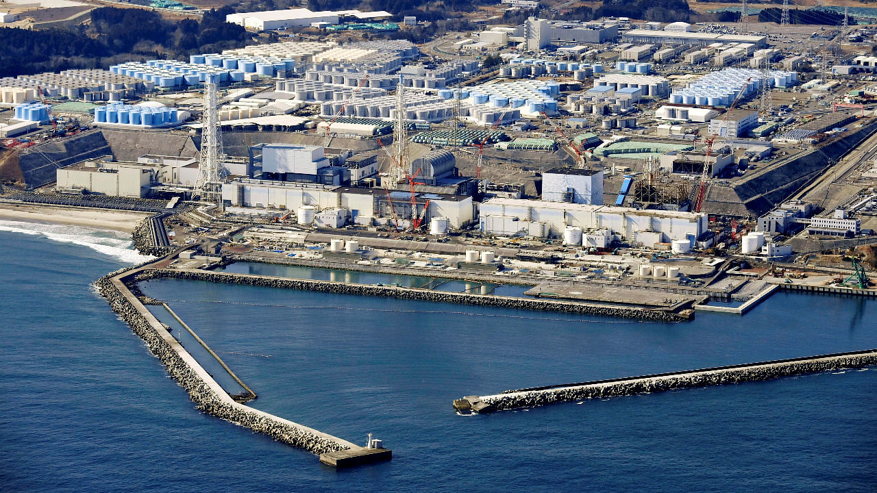 An aerial view shows the storage tanks for treated water at the tsunami-crippled Fukushima Daiichi nuclear power plant in Okuma town. Credit: Reuters Photo