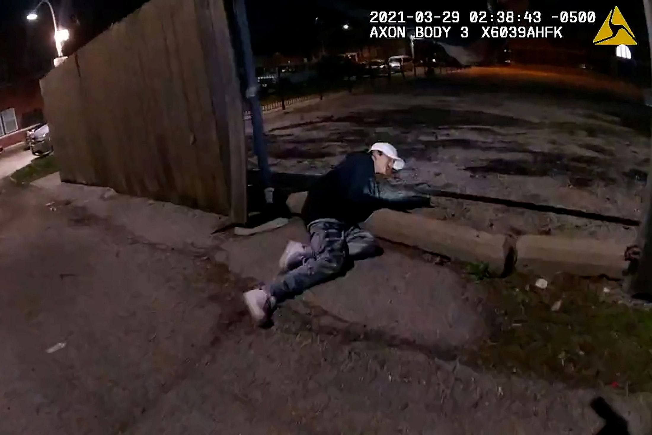 Snippet from video footage showing Adam Toledo, 13, on the ground after he was shot by police. Credit: Reuters Photo