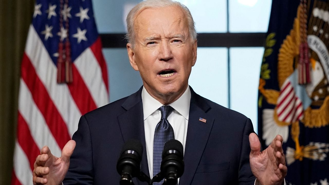 President Joe Biden announces the end to a forever war, standing at a lectern in the White House Treaty Room. Credit: AFP Photo