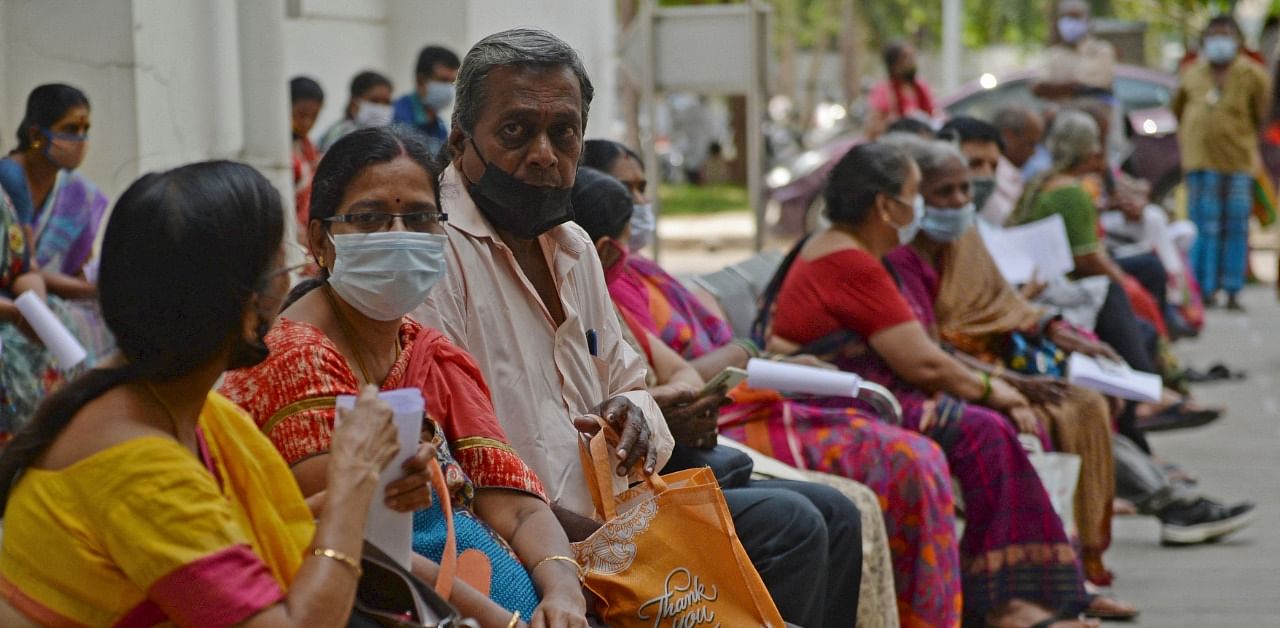 People waiting to get coronavirus vaccine at a government hospital in Chennai. Credit: AFP Photo