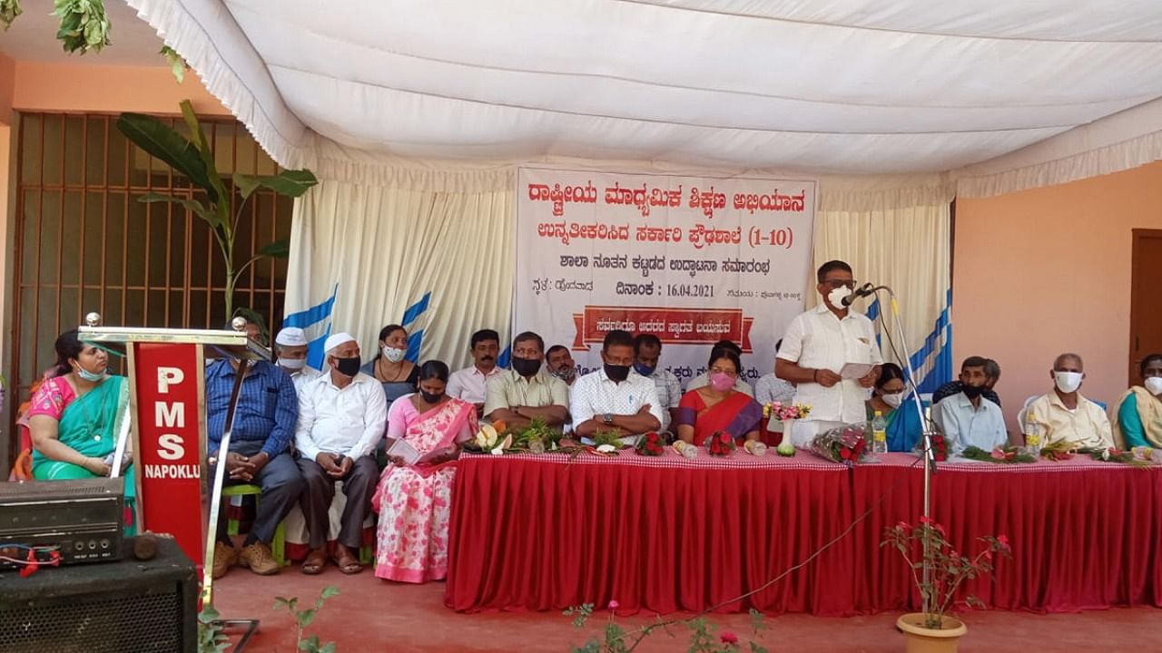 MLA M P Appachu Ranjan speaks after inaugurating the building of a high school in Hodavada. Credit: special arrangement