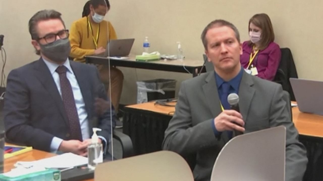 This screenshot obtained from video feed via Court TV on April 15, 2021, shows former Minneapolis police officer Derek Chauvin(R), who is accused of killing George Floyd, addressing the court on April 15, 2021, telling the presiding judge that he has decided not to testify. Credit: AFP/Court TV photo