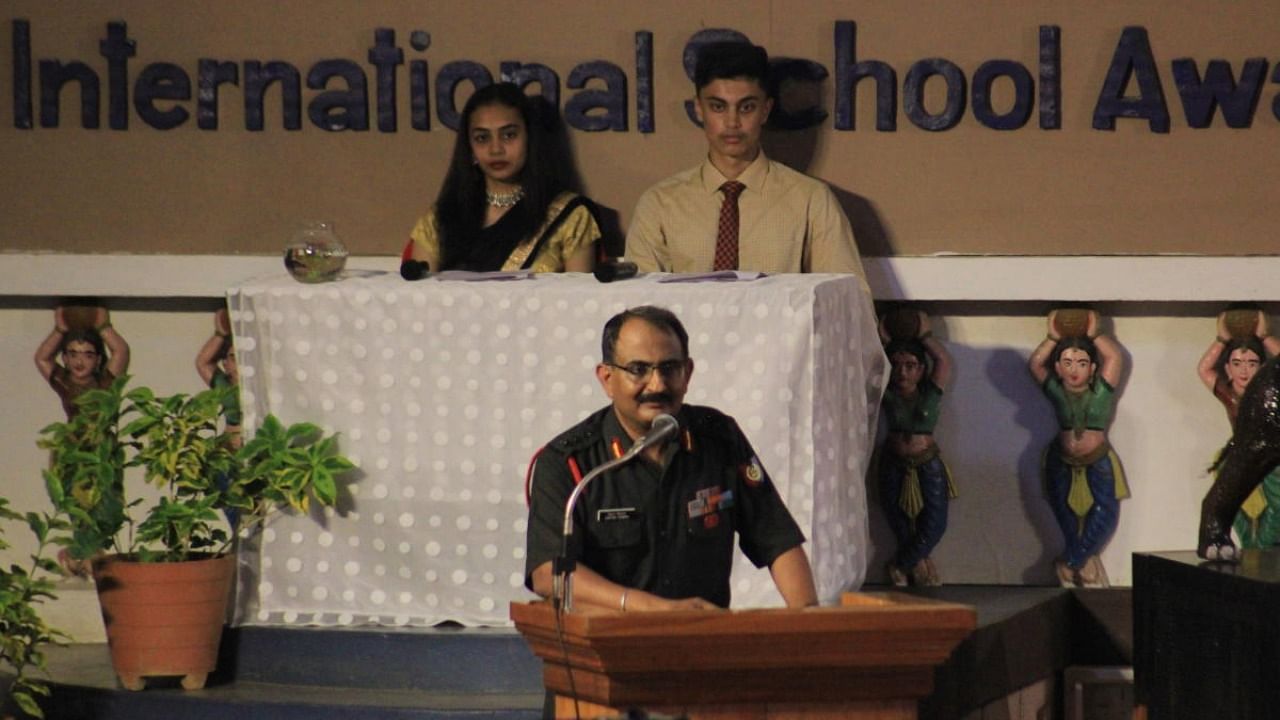 Col Chethan Dhiman, Commanding Officer, 19th NCC, addresses the students during the graduation ceremony at Coorg Public School. Credit: special arrangement