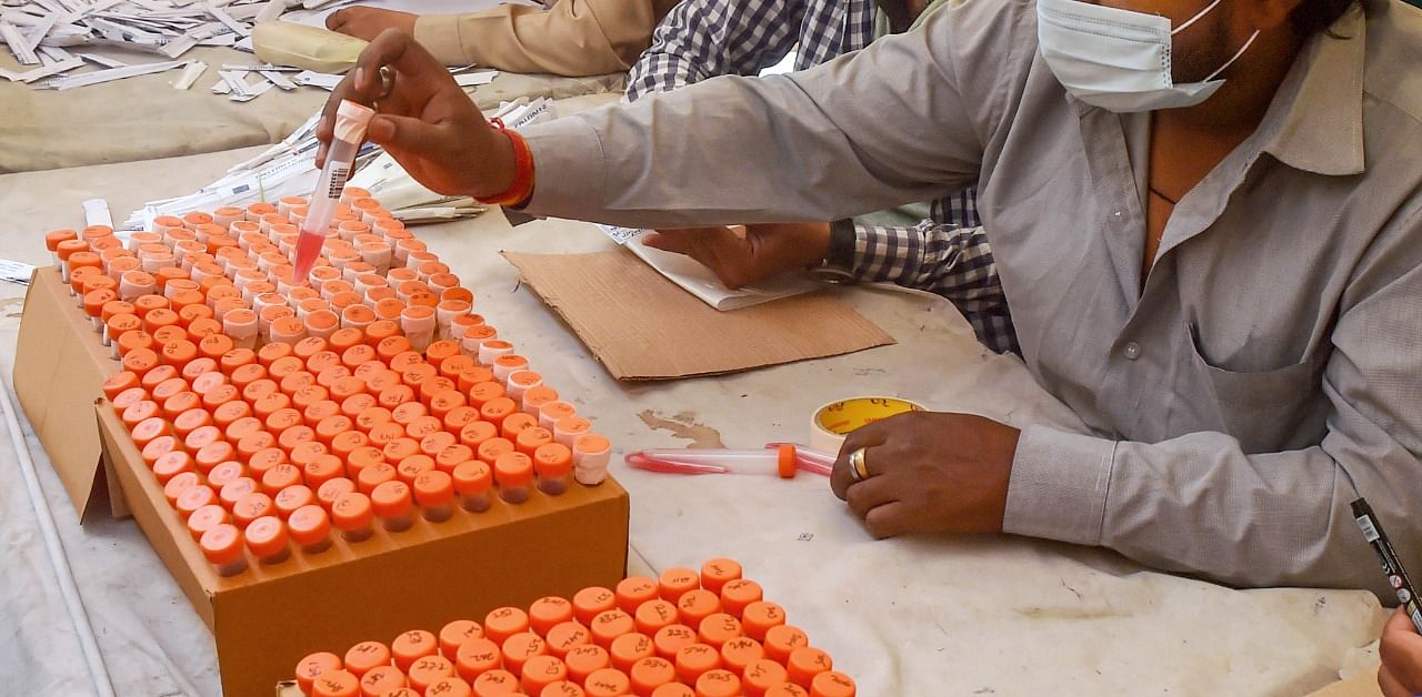 A total of 98,957 tests – 64,939 RT-PCR and 34,018 rapid antigen – were conducted in the city on Thursday. Credit: PTI Photo