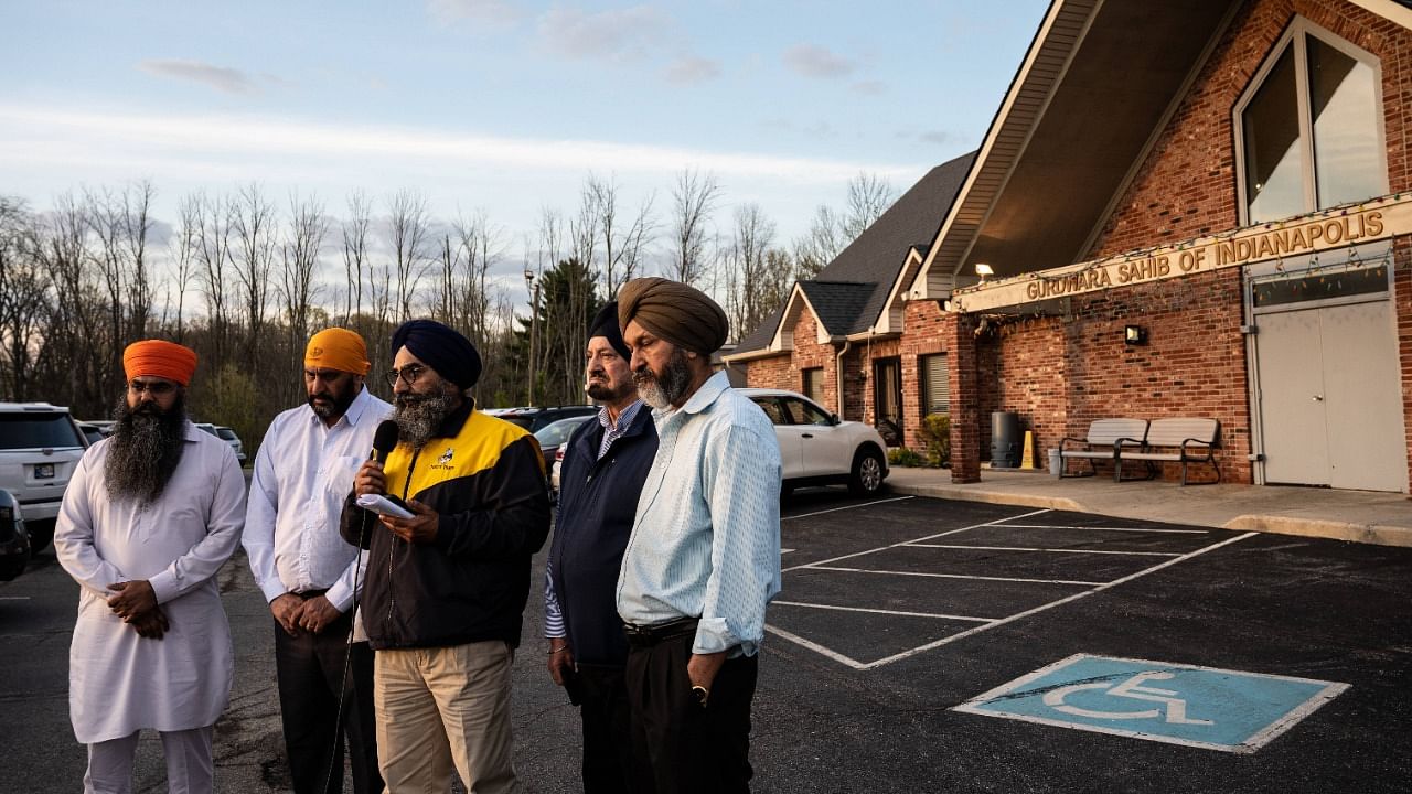 Leaders of the Sikh Satsang of Indianapolis participate in an interview addressing their grief in the parking lot of their temple on April 16, 2021 in Indianapolis, Indiana. Credit: AFP Photo