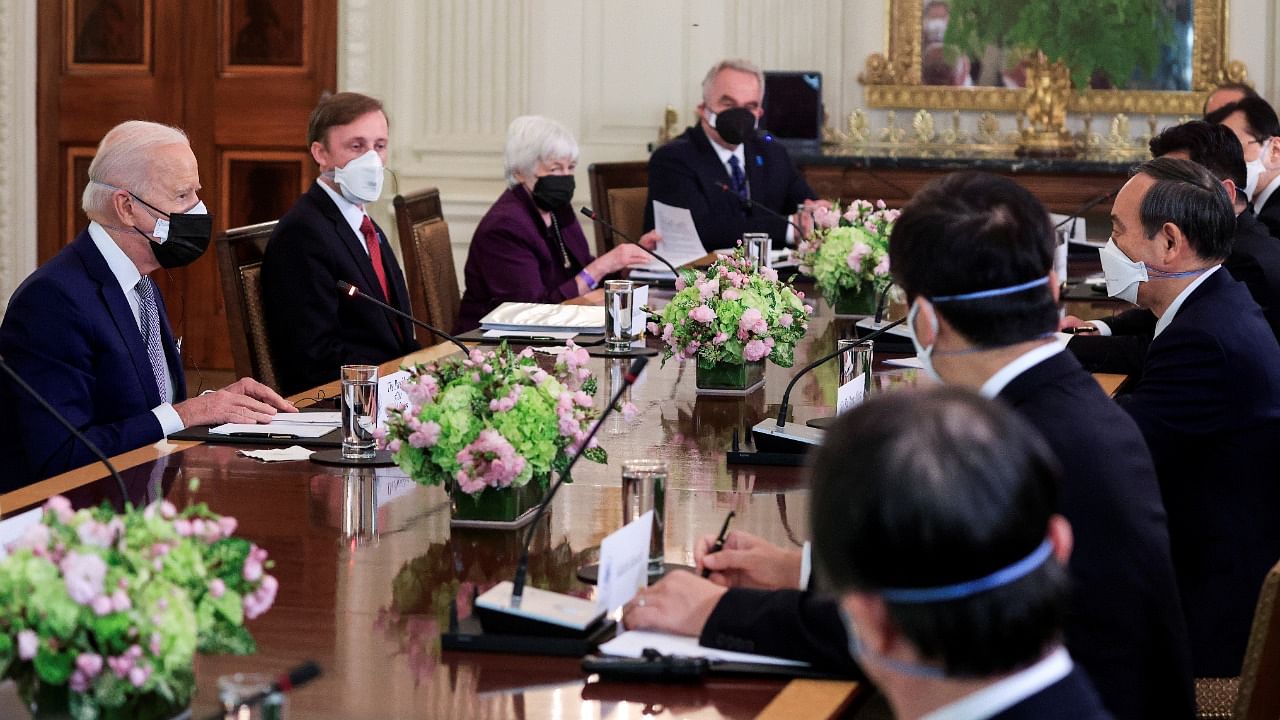 US President Joe Biden holds an expanded bilateral meeting with Japan's Prime Minister Yoshihide Suga in the State Dining Room at the White House in Washington, U.S., April 16, 2021. Credit: Reuters