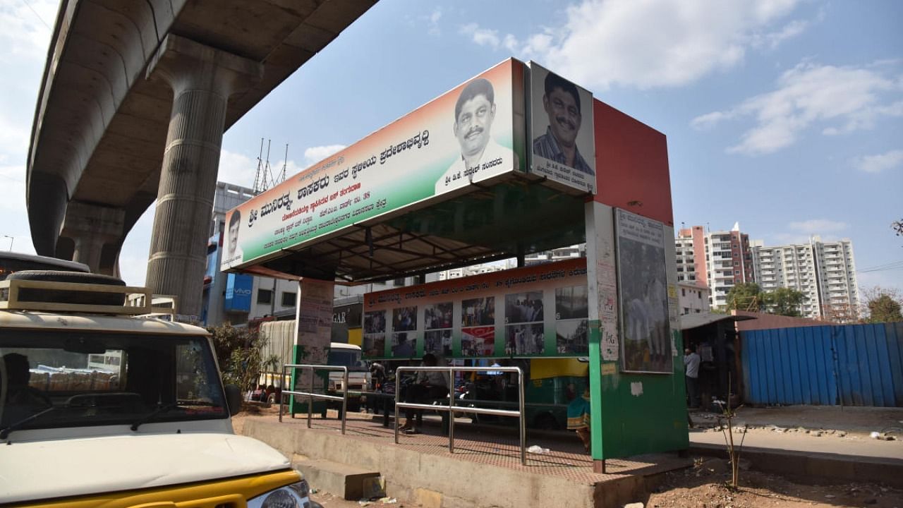 The petition sought the removal of photographs of local people’s representatives from display advertisements/hoardings in places like bus shelters. Credit: DH file photo/ B H Shivakumar