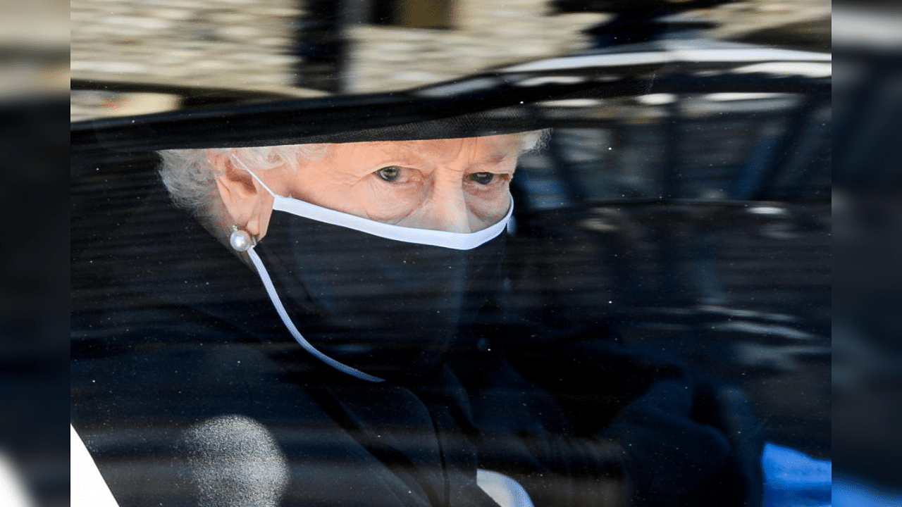 Britain's Queen Elizabeth II arrives for the funeral of Britain's Prince Philip, who died at the age of 99, at St George's Chapel, in Windsor, Britain, April 17, 2021. Credit: Reuters Photo