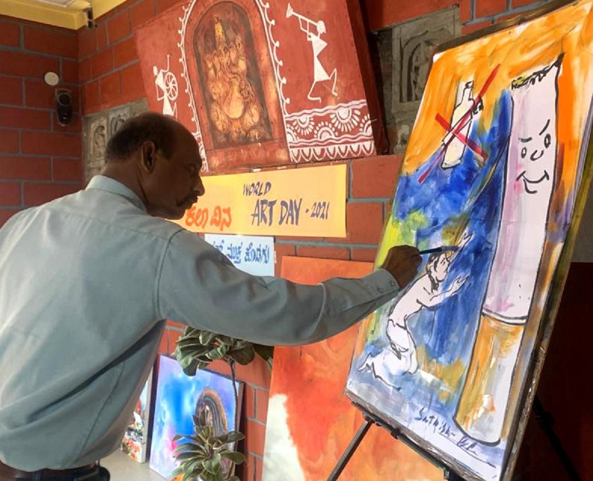 Artist B R Sathish in the Kunchagayana in Virajpet.