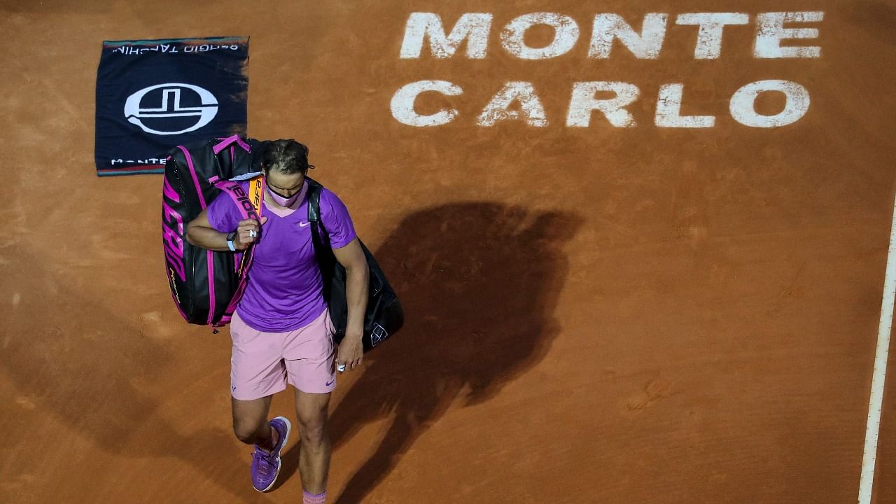 Spain's Rafael Nadal leaves the court after losing his quarter final singles match against Russia's Andrey Rublev on day seven of the Monte-Carlo ATP Masters Series tournament in Monaco. Credit: AFP photo