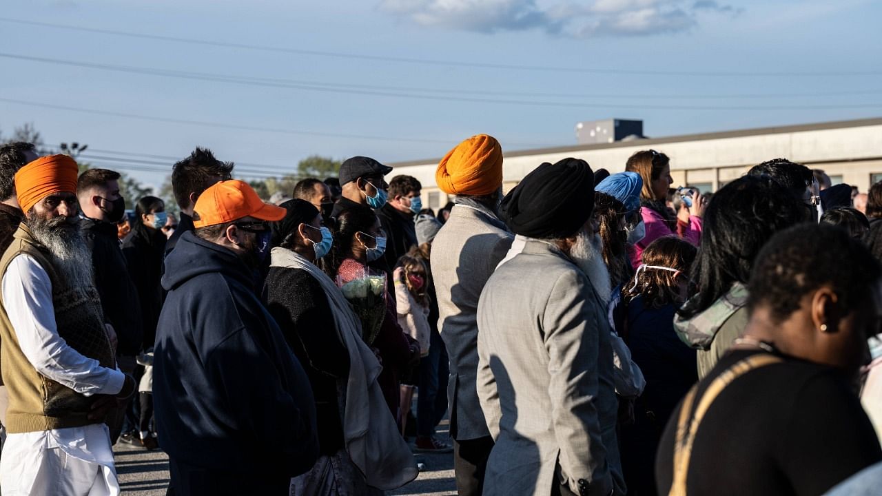 At Sikh temples across Indianapolis, members gathered Saturday to mourn, pray and reflect on the circumstances of the shooting. Credit: AFP Photo