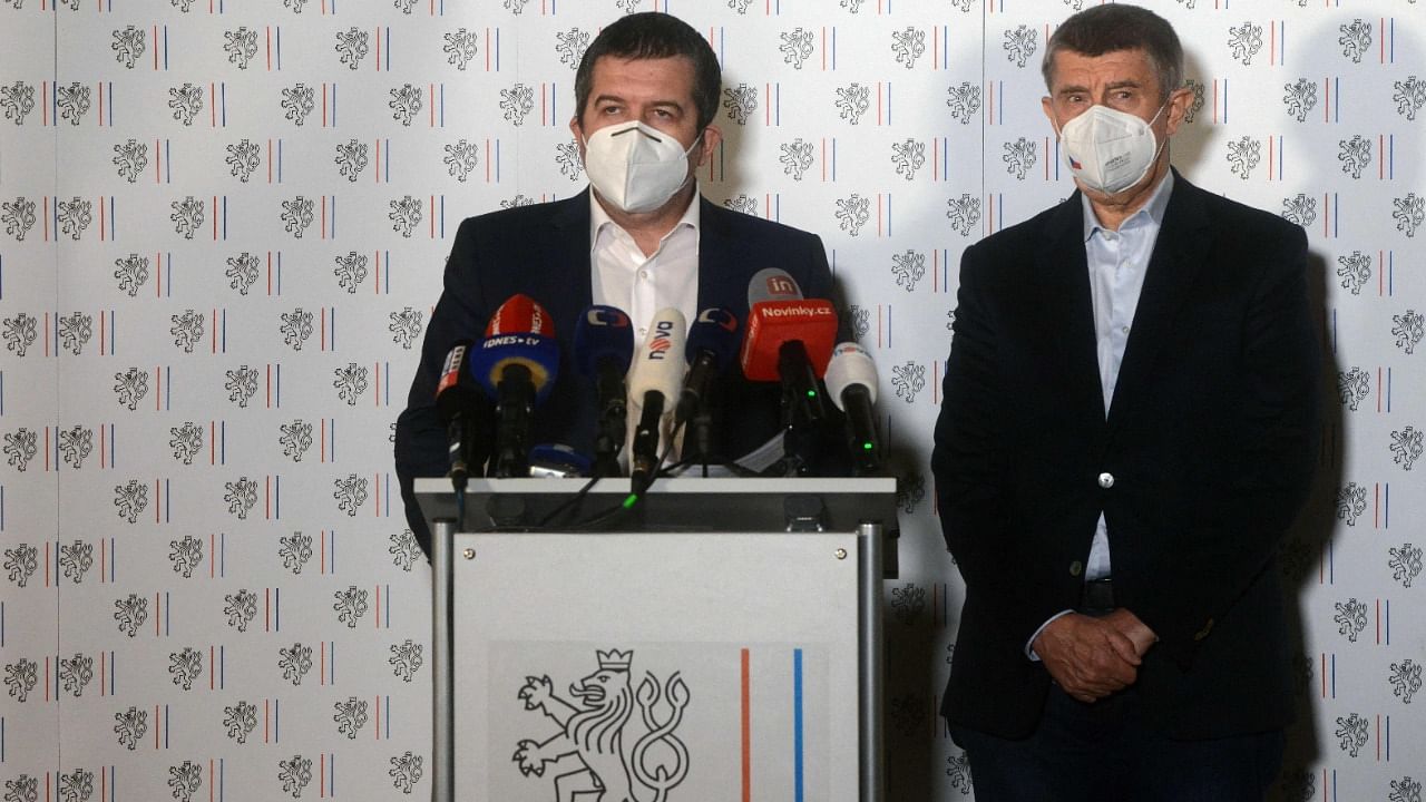 Czech Prime Minister Andrej Babis (R) and Czech Foreign Minister and Interior Minister Jan Hamacek wear face masks at a press conference on April 17, 2021 in Prague where it was announced that the Czech Republic will expel 18 Russian diplomats. Credit: AFP photo