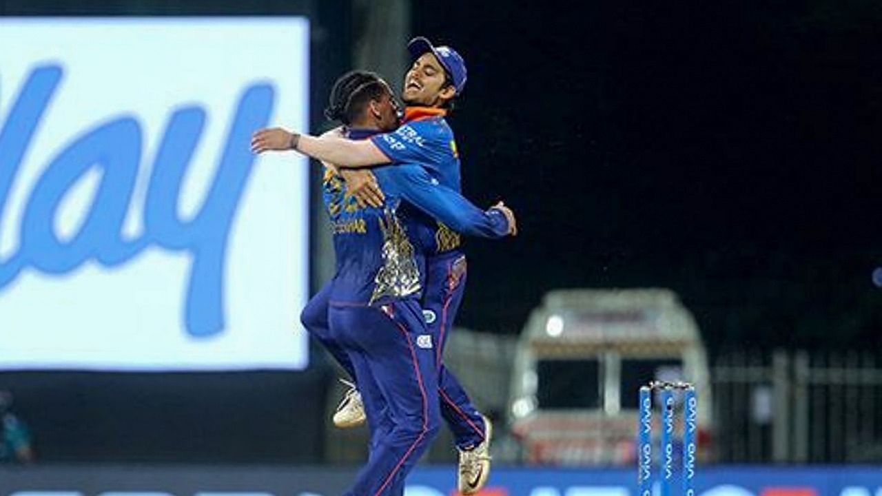 Rahul Chahar of Mumbai Indians and Ishan Kishan of Mumbai Indians celebrates the wicket of Abhishek Sharma of Sunrisers Hyderabad during match 9 of the Indian Premier League 2021 between the Mumbai Indians and the Sunrisers Hyderabad, at the M. A. Chidambaram Stadium in Chennai. Credit: PTI photo