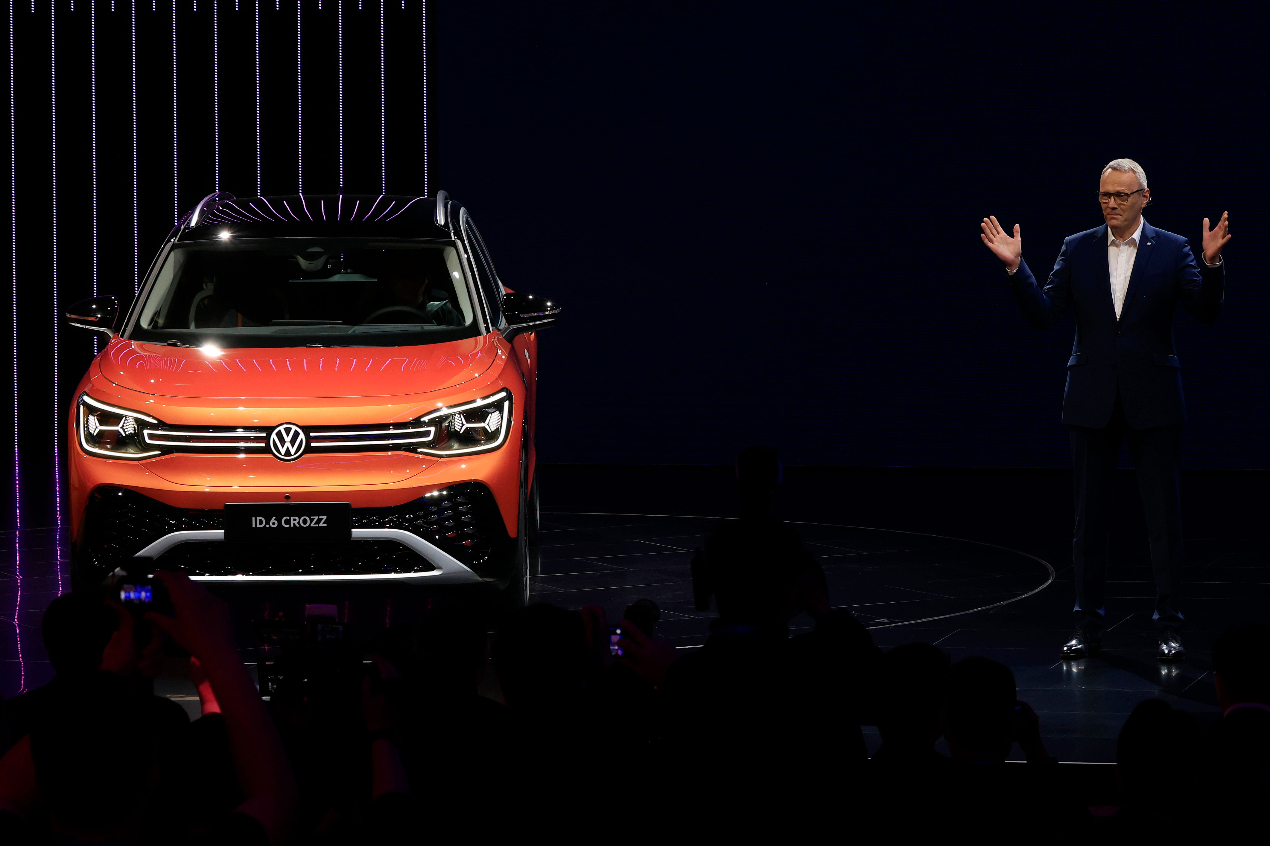 Stephan Wollenstein, CEO of Volkswagen Group China, introduces the ID 6 electric SUV at the Shanghai Auto Show in Shanghai on Monday. Credit: AP/ PTI Photo