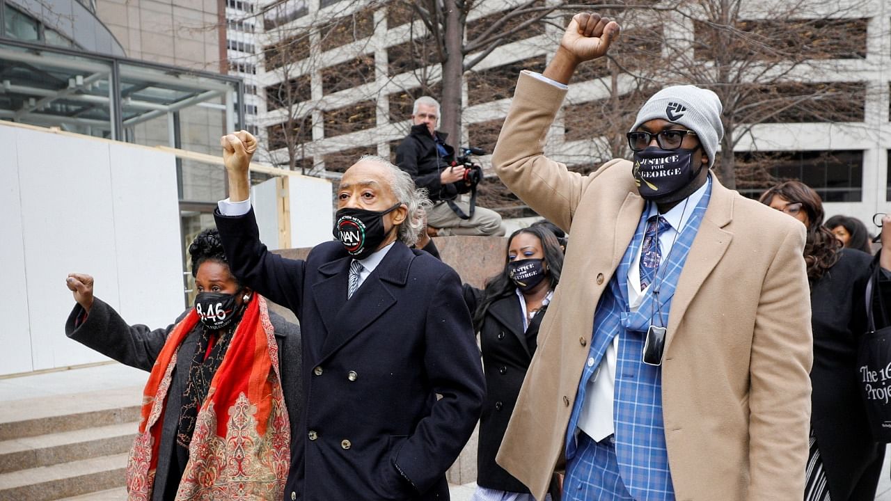 The Floyd family and Reverend Al Sharpton gesture as they arrive at the Hennepin County Government Center for closing statements in the trial of former police officer Derek Chauvin, who is facing murder charges in the death of George Floyd, in Minneapolis, Minnesota. Credit: Reuters Photo