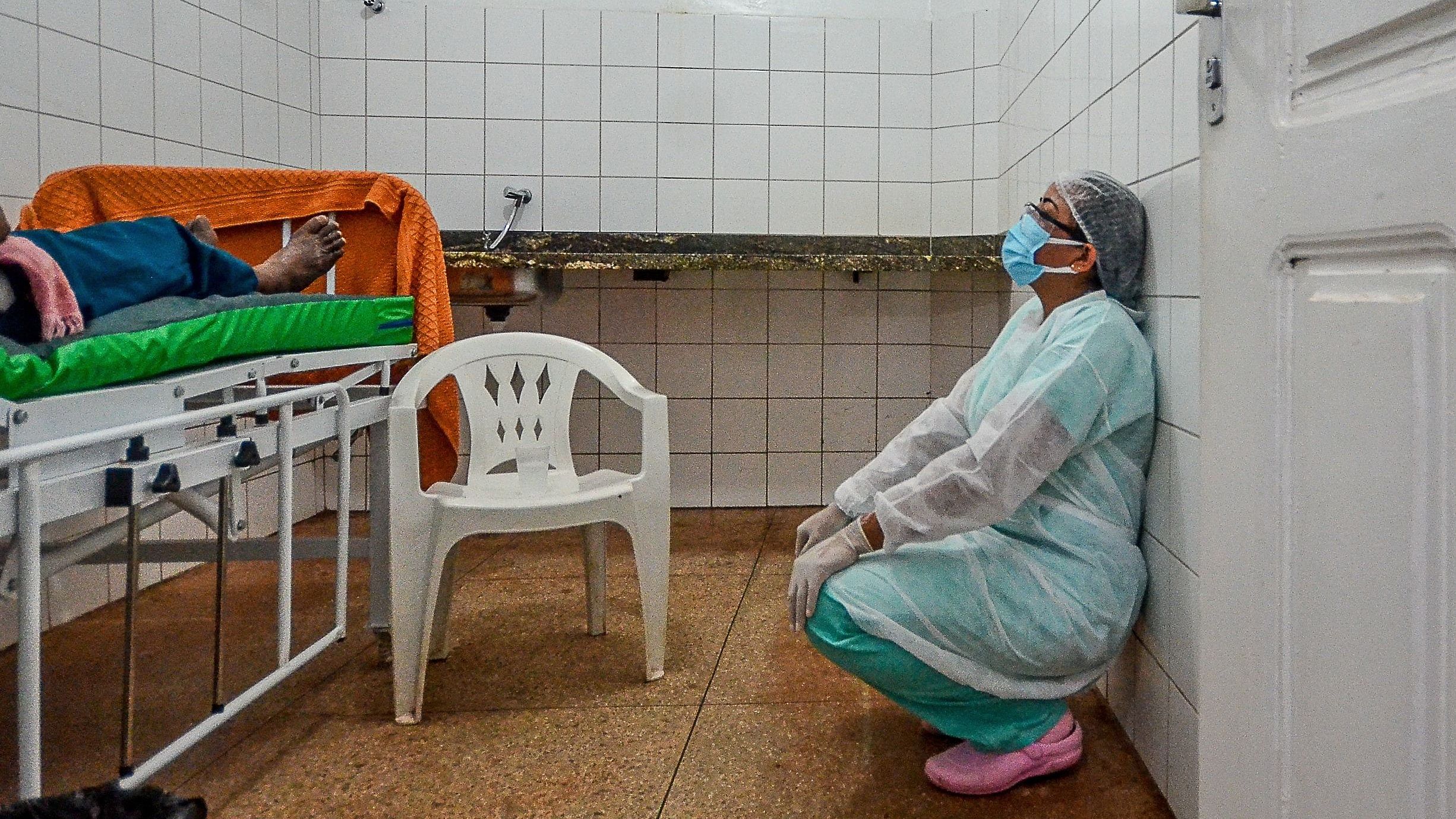 As caseloads push medical facilities toward capacity, the health system itself is starting to crack. Vaccine stocks, hospital beds and even oxygen supplies are running short, leading to bitter arguments between the states and the federal government. Credit: AFP File Photo