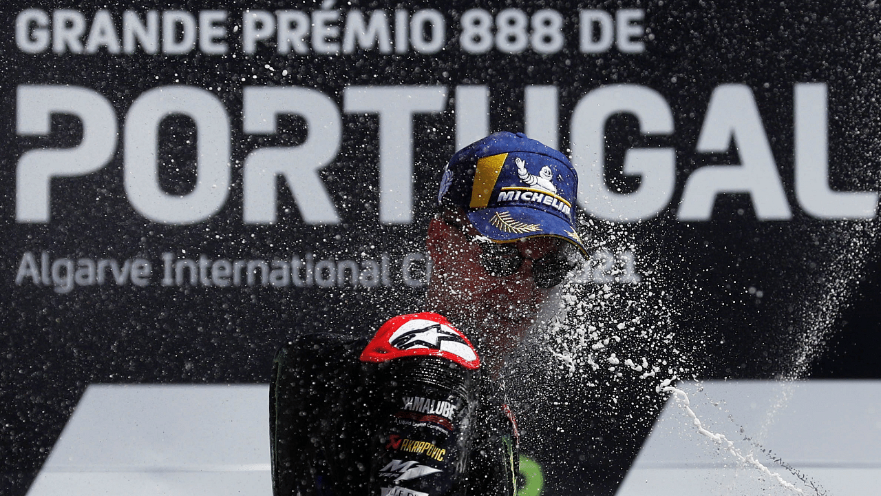 Frenchman Fabio Quartararo presents a happy picture after winning the MotoGP race in Portugal. Credit: Reuters Photo
