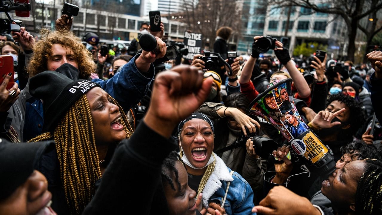 People celebrate as the verdict is announced in the trial of former police officer Derek Chauvin outside the Hennepin County Government Center in Minneapolis, Minnesota. Credit: AFP Photo